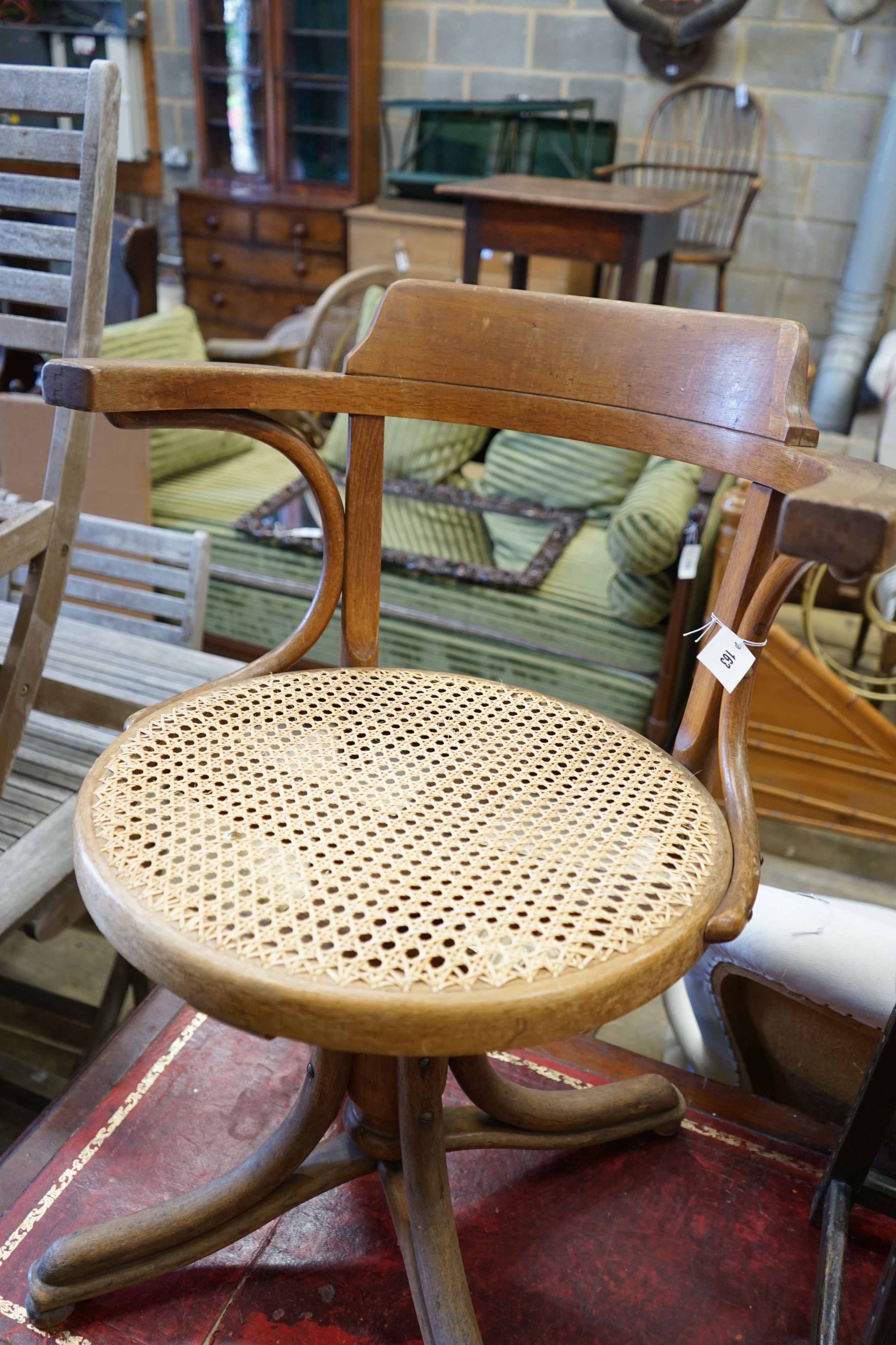 A cane seat bentwood office chair